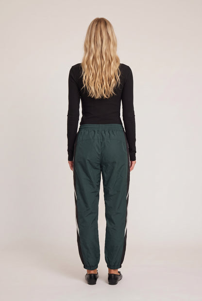
model wearing Aniston Pant posing Back View