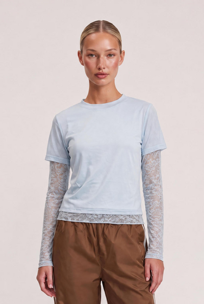 
model wearing Baby Bottega Tee posing Front View