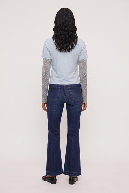
model wearing Baby Bottega Tee posing Front View