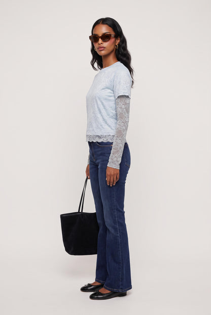 
model wearing Baby Bottega Tee posing Front View