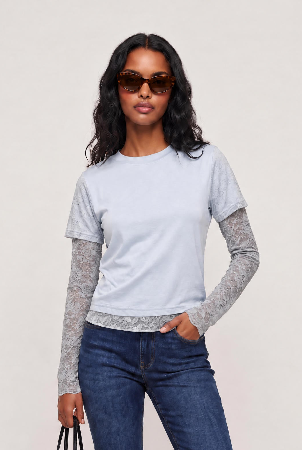 
model wearing Baby Bottega Tee posing Front View