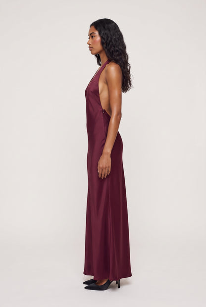 
model wearing Bare Maxi Dress posing Side View