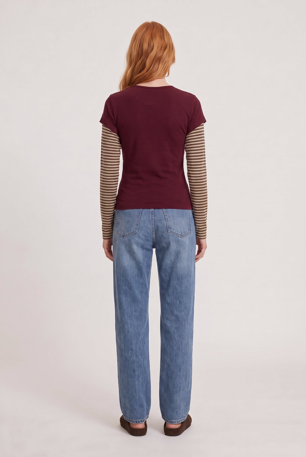 
model wearing Bloom Layered Long Sleeve posing Back View