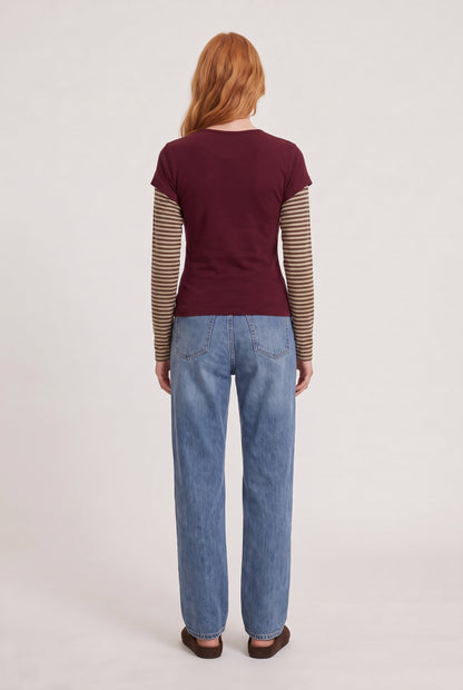 
model wearing Bloom Layered Long Sleeve posing Back View