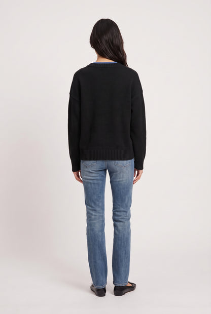 
model wearing Dolce V Knit posing Back View