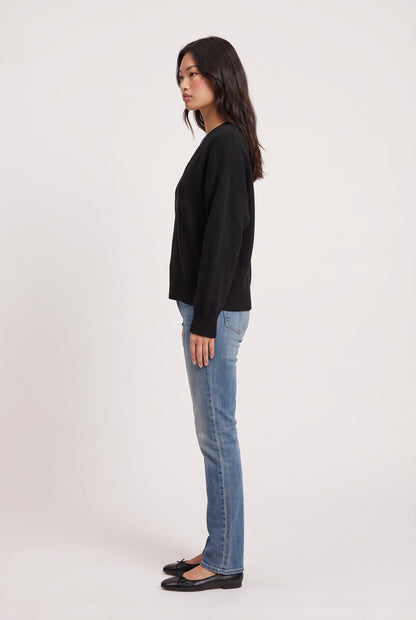 
model wearing Dolce V Knit posing Side View