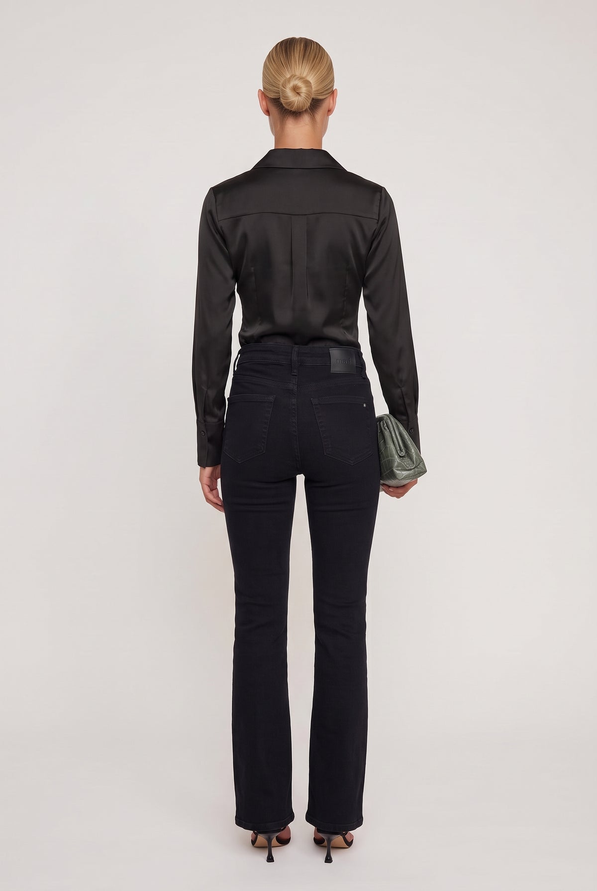 [BLACK] model wearing High Rise Tummy Tuck Flare posing Back View