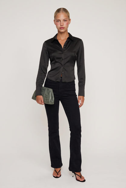 
model wearing High Rise Tummy Tuck Flare posing Front View