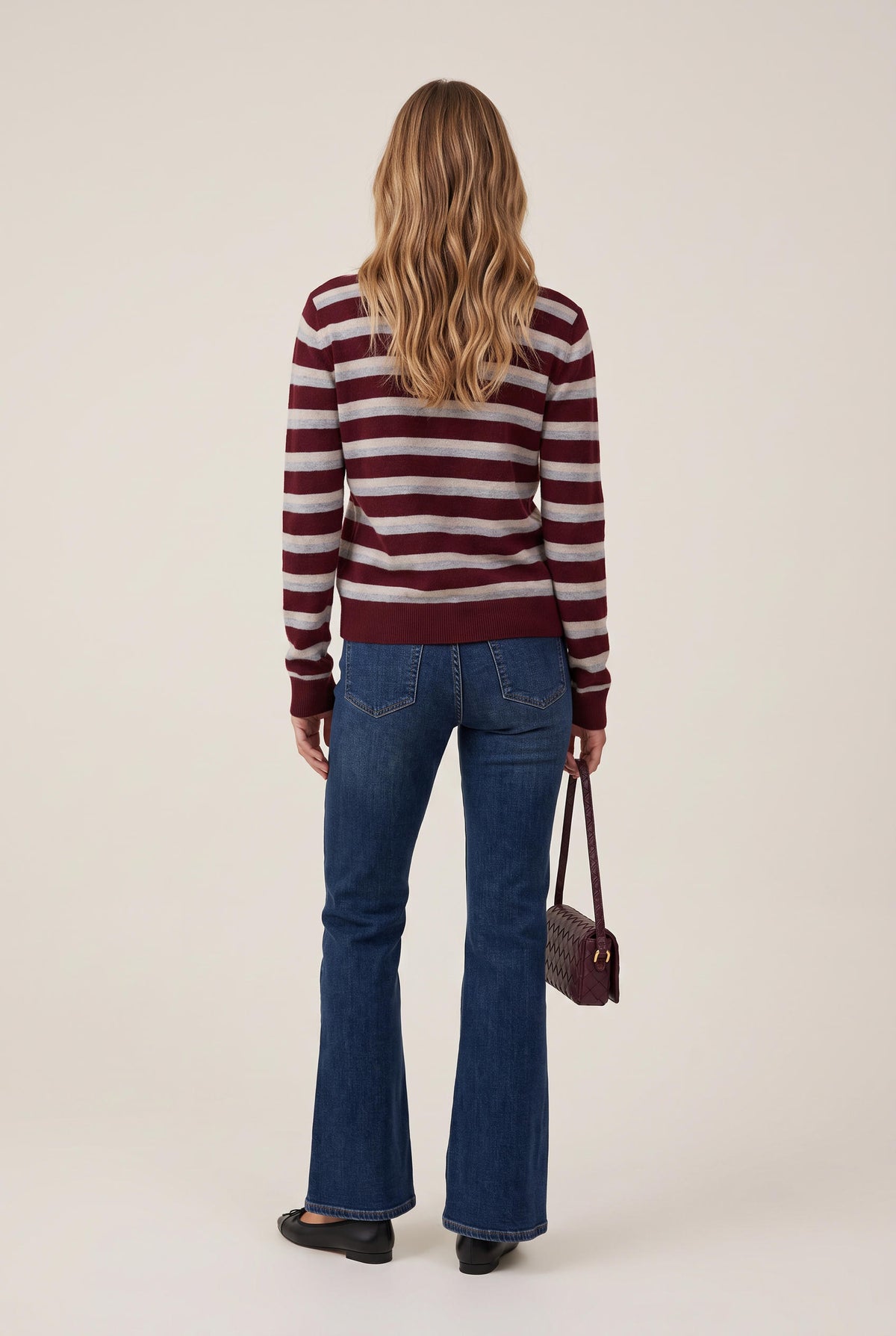 [DENIM] model wearing Mid Rise Flare Dark posing Front View