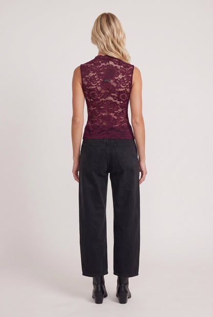 
model wearing Candace V-neck Lace Tank posing Back View