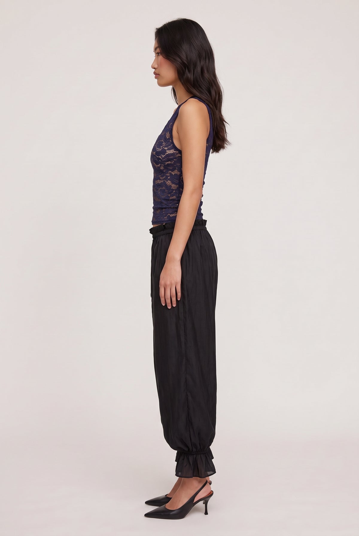 [BLUE] model wearing Candace V-neck Lace Tank posing Side View