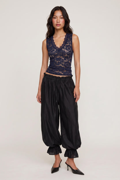 
model wearing Candace V-neck Lace Tank posing Front View