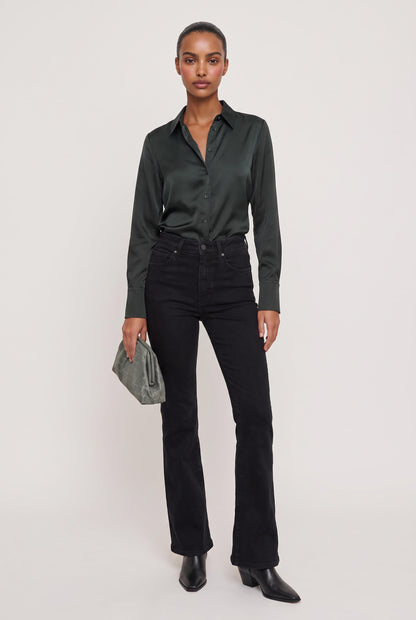 
model wearing High Low Satin Shirt posing Front View