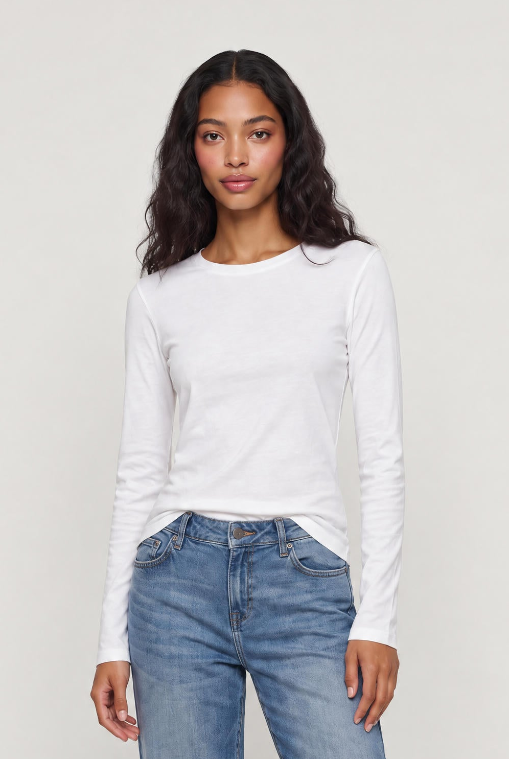 [IVORY] model wearing Long Sleeve Crewneck Shirt posing Front View