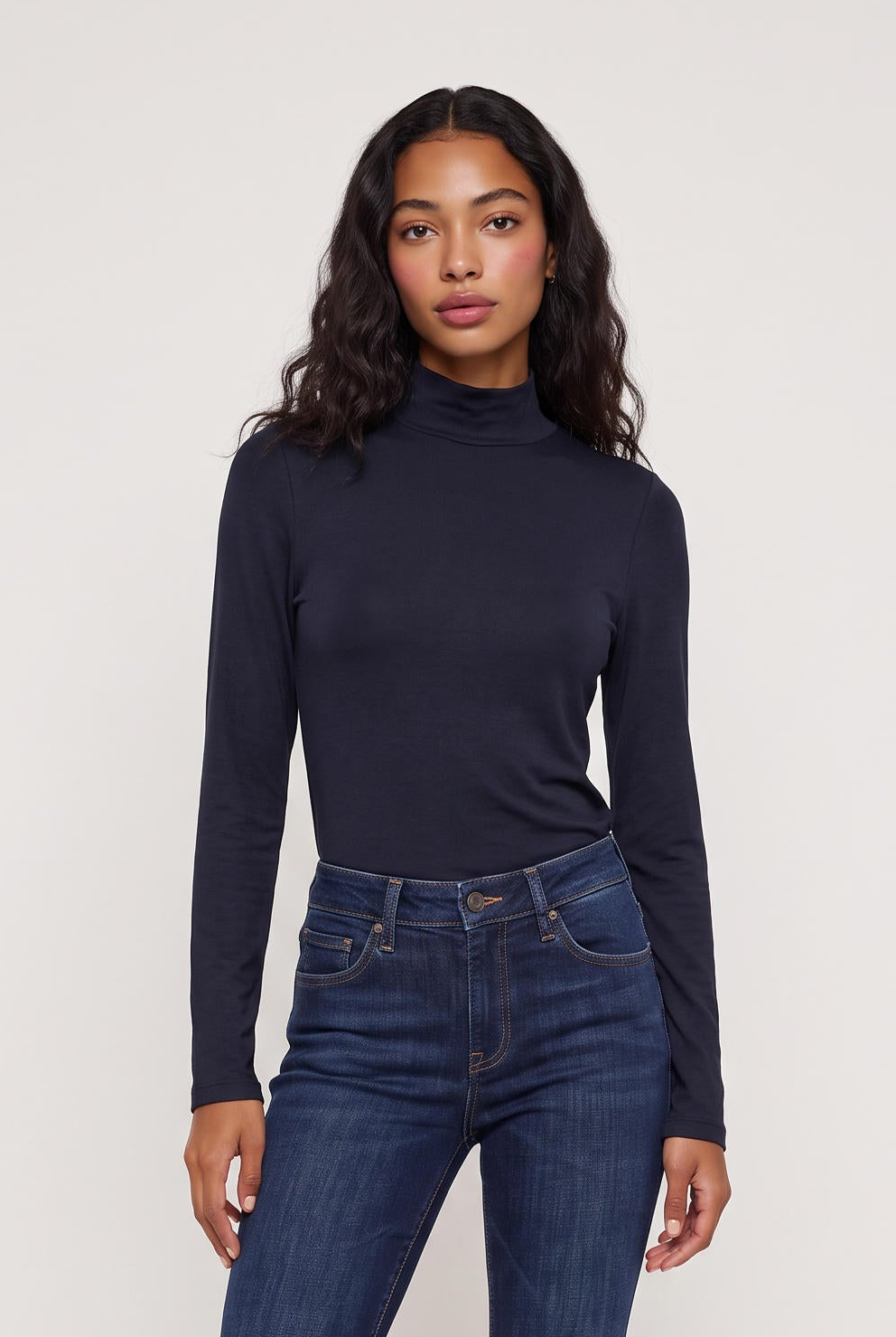 
model wearing Mock Neck Knit Top posing Front View
