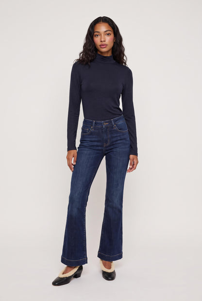 
model wearing Mock Neck Knit Top posing Front View