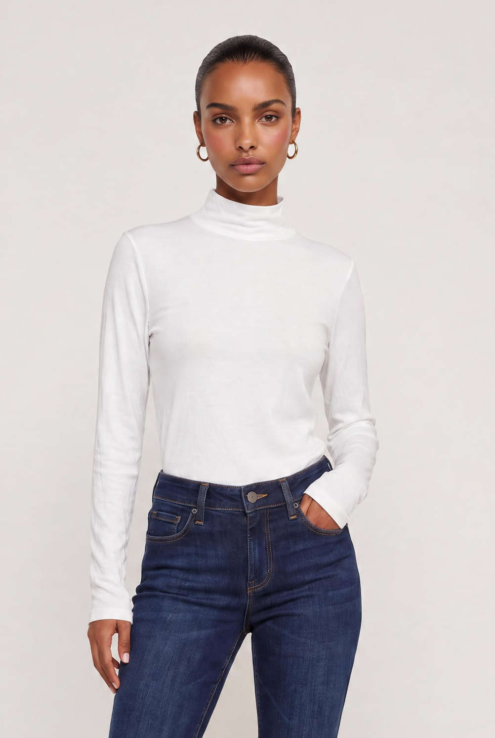 
model wearing Mock Neck Long Sleeve Knit Top posing Front View