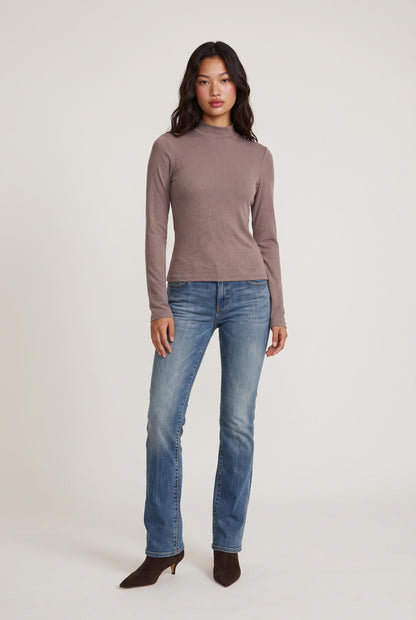 
model wearing Mock Neck Long Sleeve Knit Top posing Front View