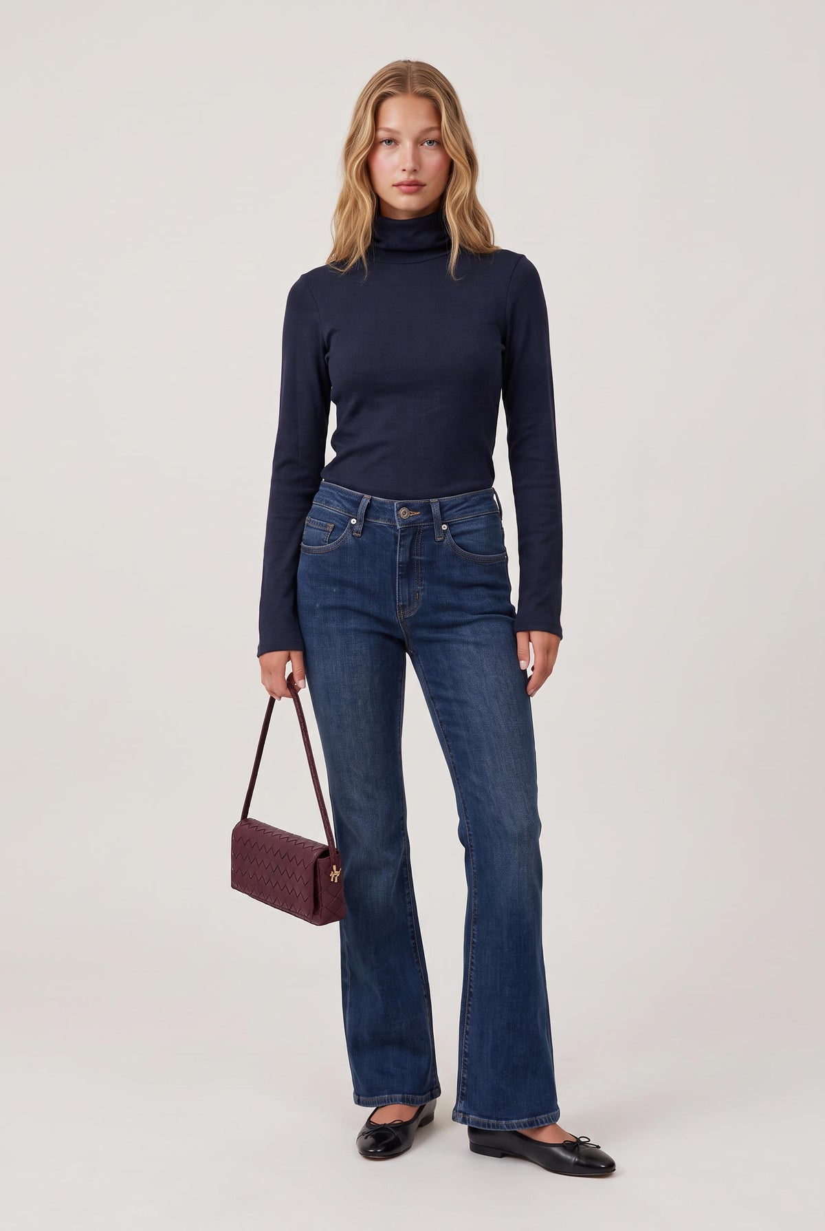 
model wearing Turtleneck Knit Long Sleeve posing Front View