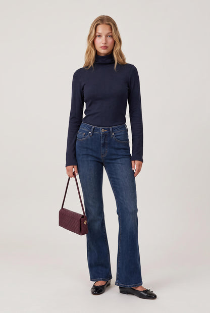 
model wearing Turtleneck Knit Long Sleeve posing Front View