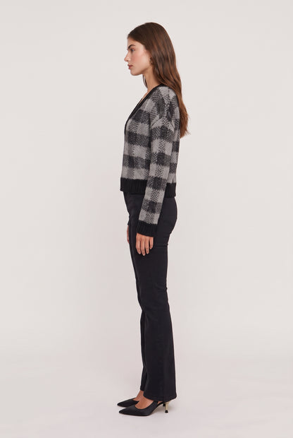 
model wearing Helga Knit Sweater posing Side View