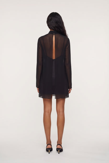 
model wearing Leo Turtleneck posing Back View