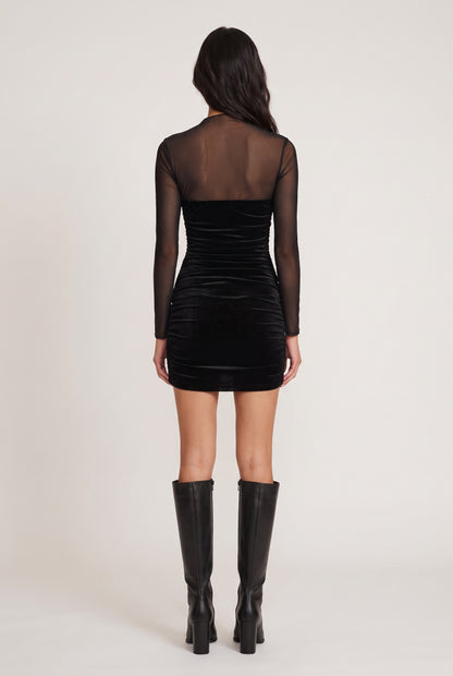 
model wearing Neda Velvet posing Back View