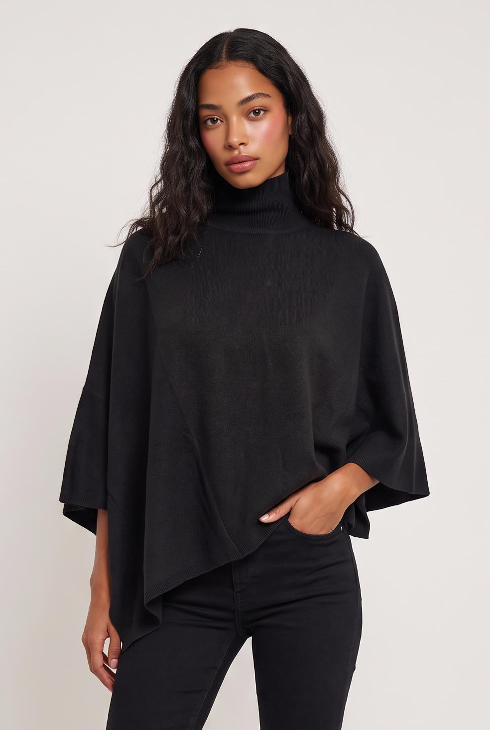 
model wearing Tiwa Cape posing Front View