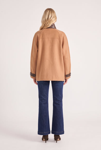 
model wearing Yanna Coat posing Back View