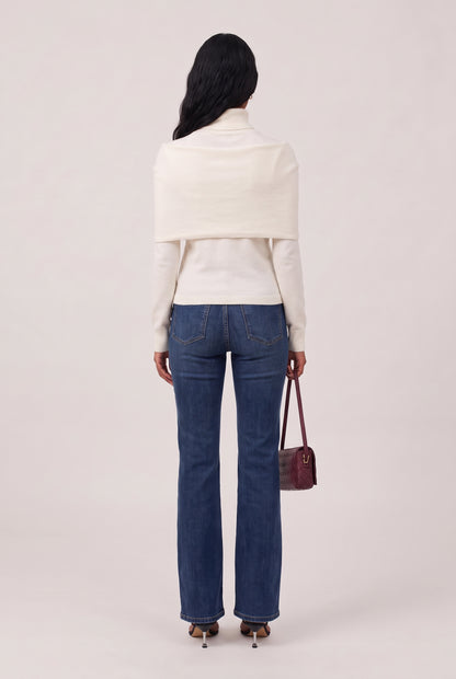 
model wearing Zephy Knit Top posing Back View