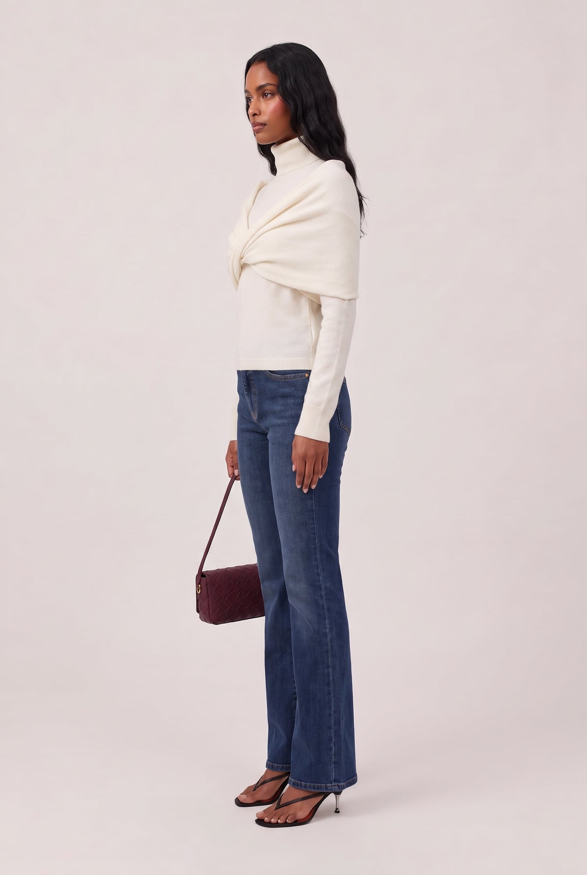 
model wearing Zephy Knit Top posing Side View