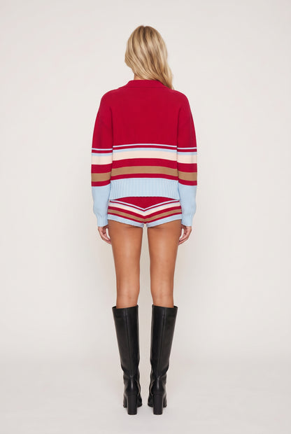
model wearing The Cleo Pullover posing Back View