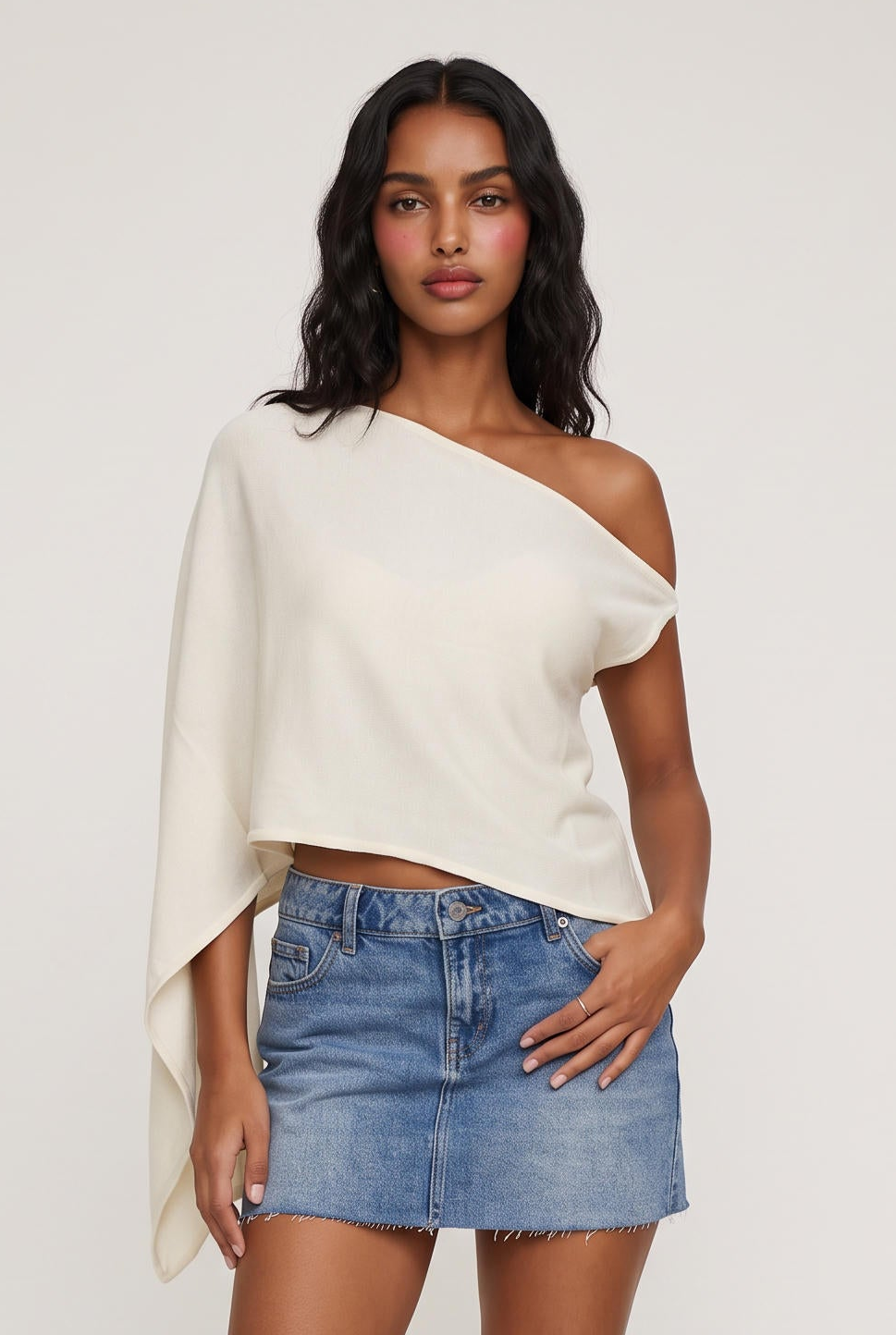 
model wearing Tyla Poncho posing Front View