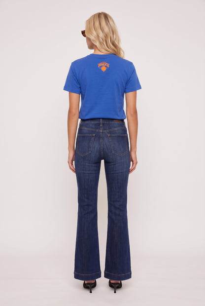 
model wearing Knicks Championship Baby Tee posing Back View