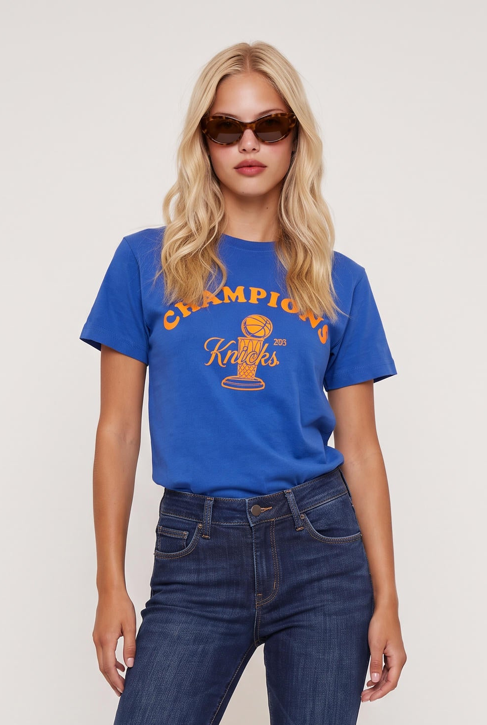 [NAVY] model wearing Knicks Championship Baby Tee posing Front View