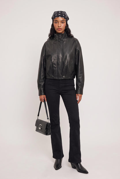 
model wearing Shoulder Bag W Silver Clasp posing Front View