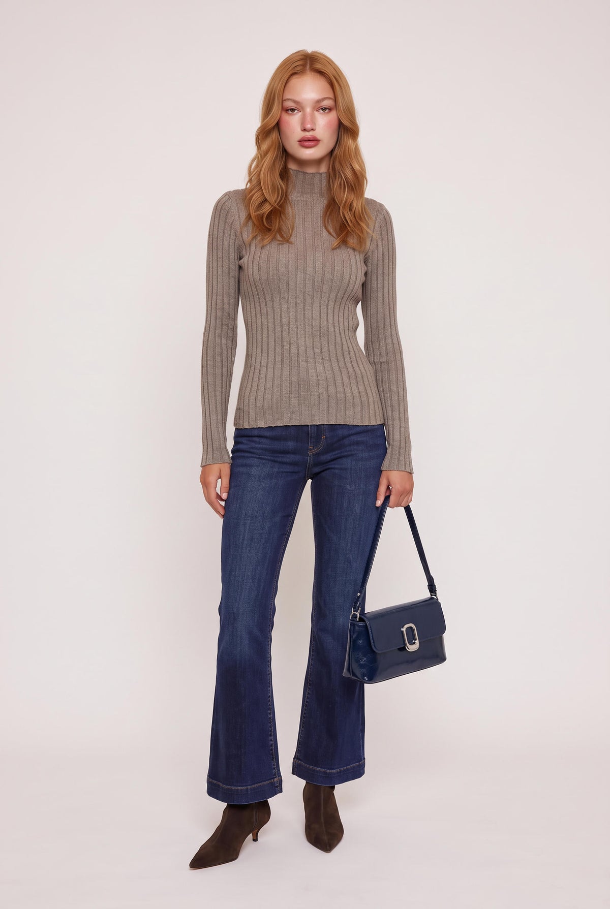 
model wearing Shoulder Bag W Silver Clasp posing Front View
