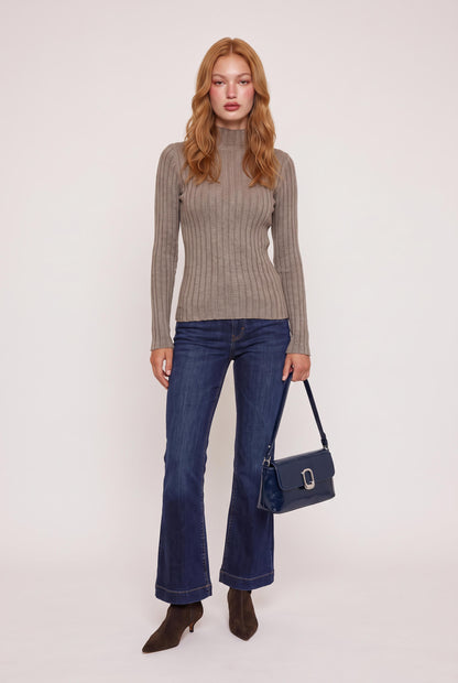 
model wearing Shoulder Bag W Silver Clasp posing Front View