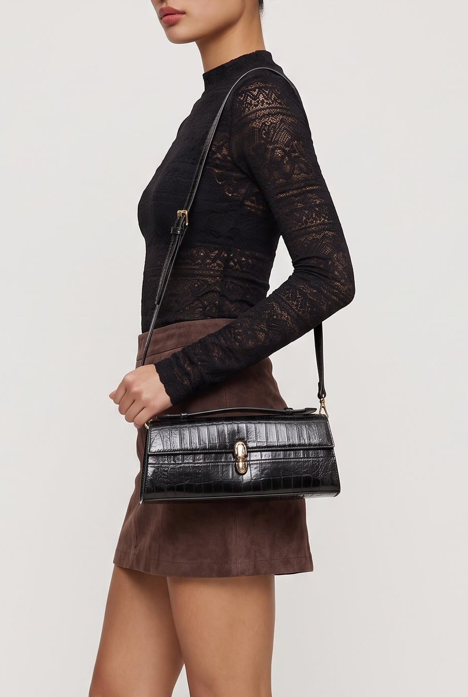 [BLACK] model wearing Top Handle Bag posing Front View