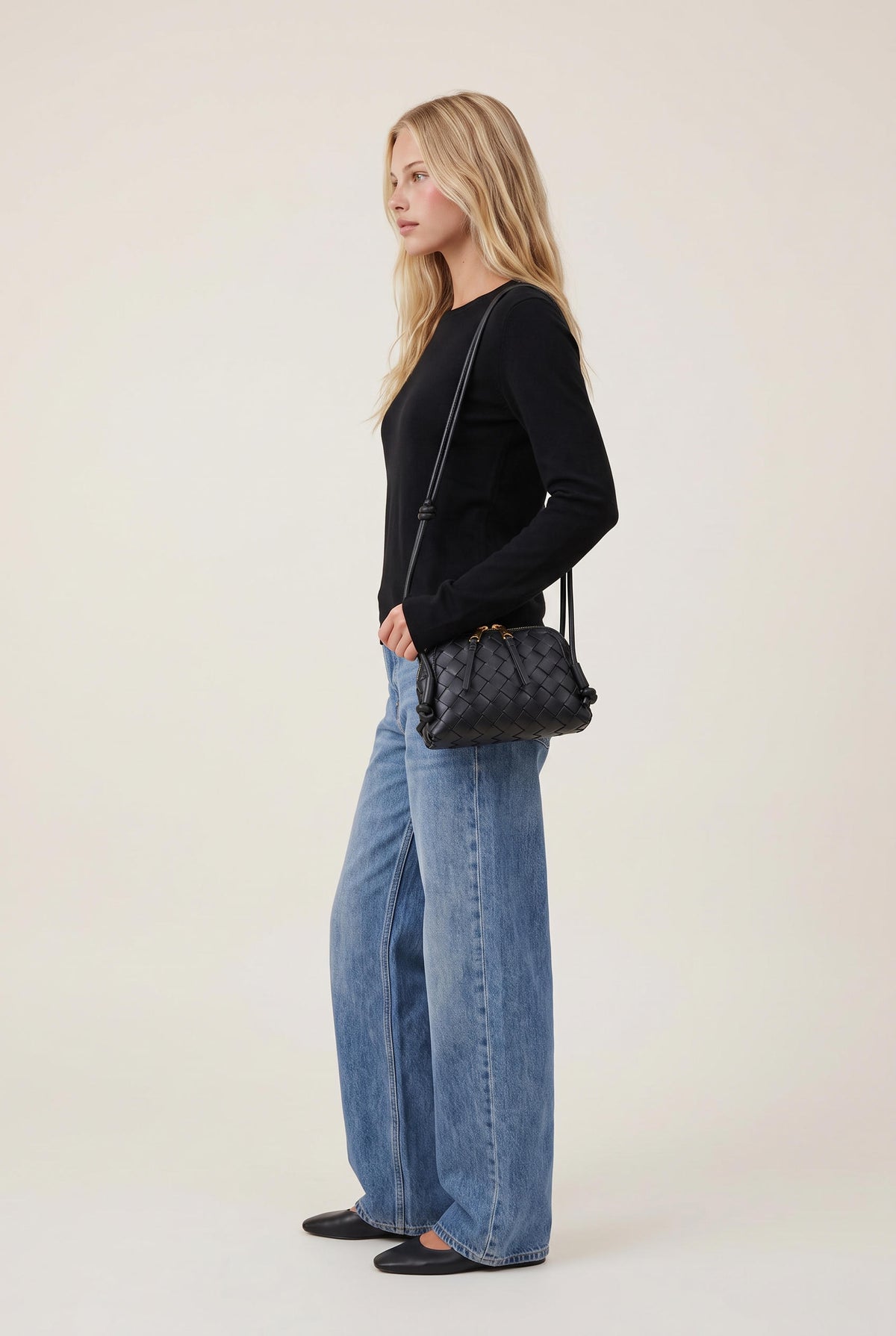 
model wearing Woven Crossbody Bag posing Front View