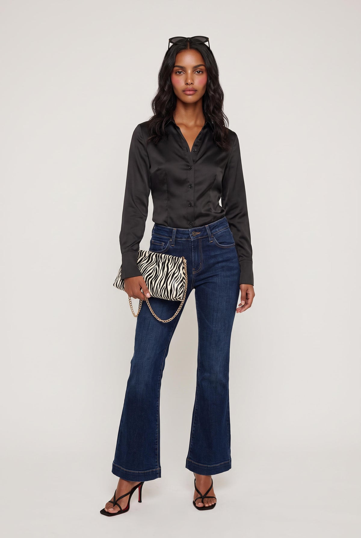 
model wearing Mid Rise Dark Flare posing Front View