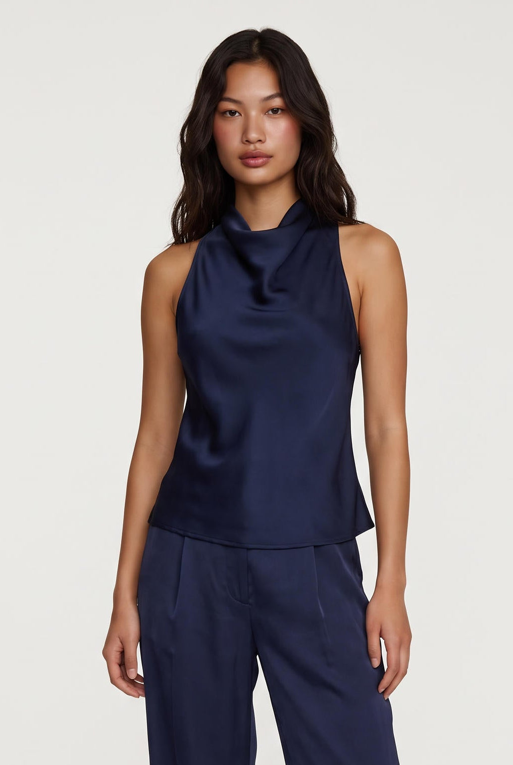 
model wearing Aman Satin Tank posing Front View