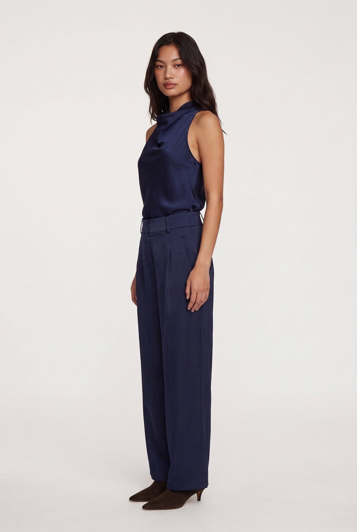 [NAVY] model wearing Aman Satin Trouser posing Side View