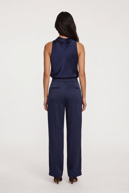 
model wearing Aman Satin Trouser posing Back View