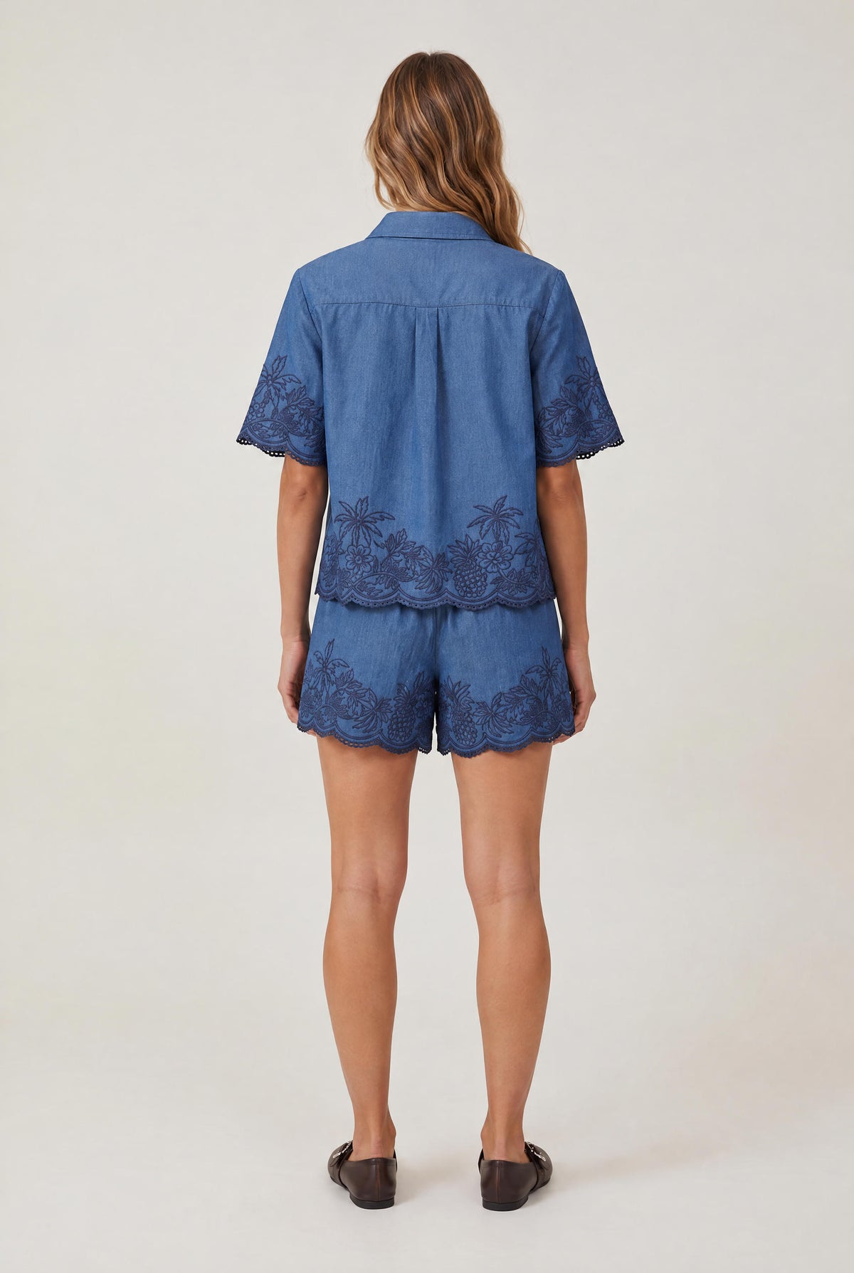 
model wearing Blair Embroidered Top posing Front View