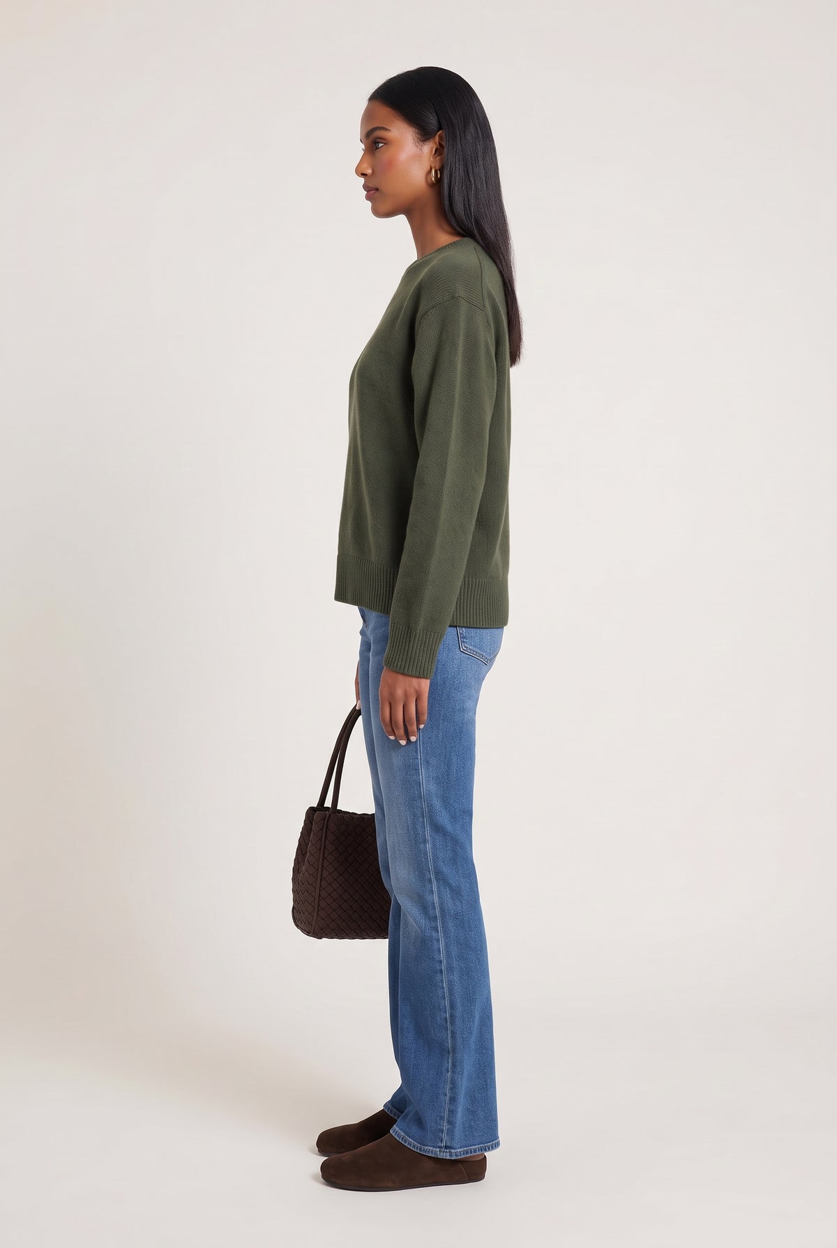 
model wearing Classic 100% Cashmere Crew posing Side View