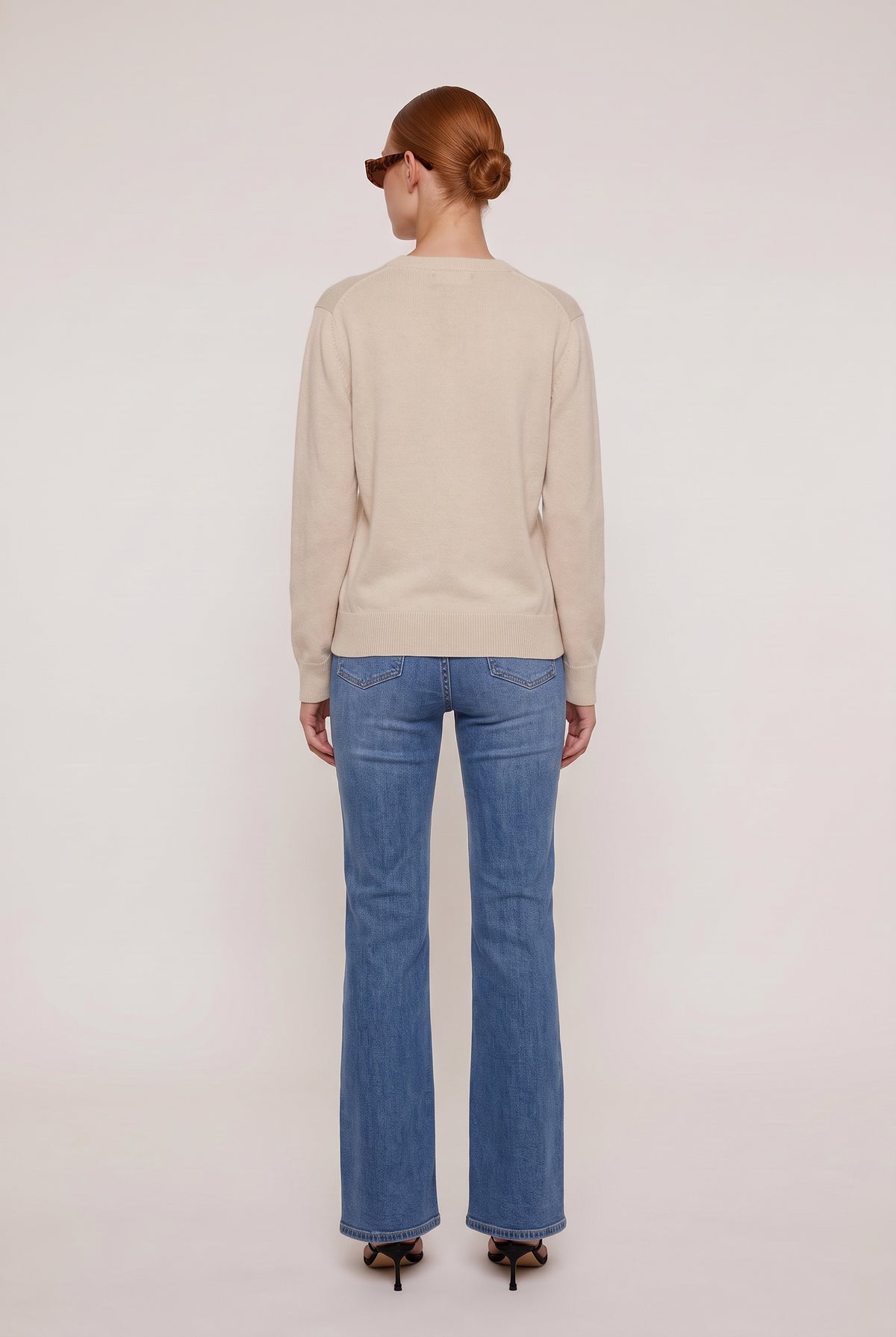
model wearing Classic 100% Cashmere Crew posing Back View