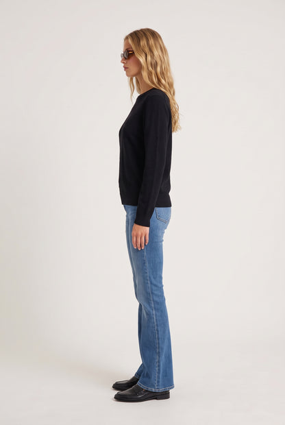 
model wearing Classic 100% Cashmere Crew posing Side View