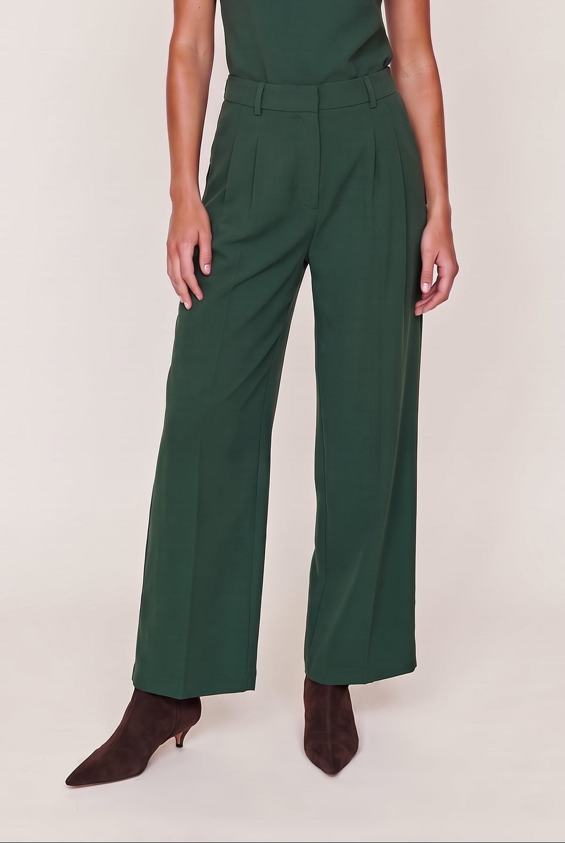 
model wearing Lili Pleated Trouser posing Front View