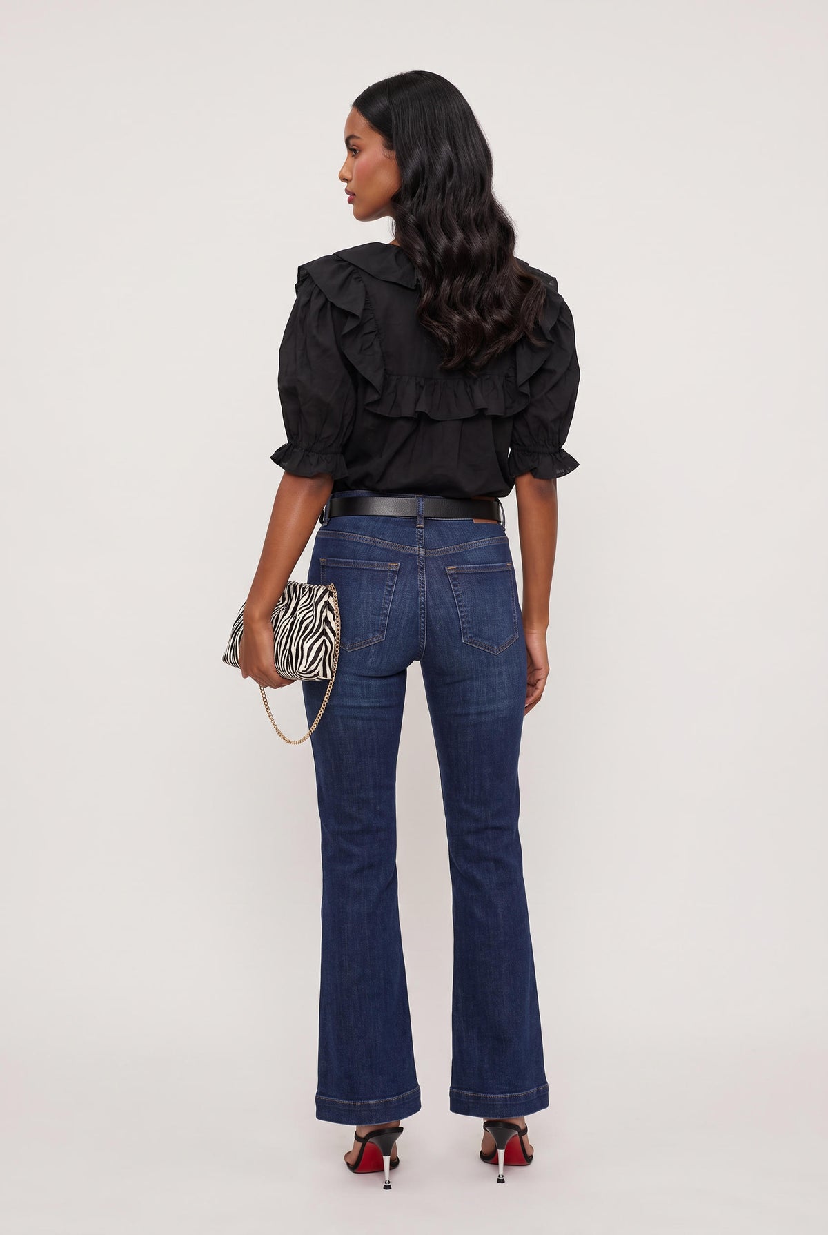 
model wearing Sage Ruffled Lace Trim Top posing Front View